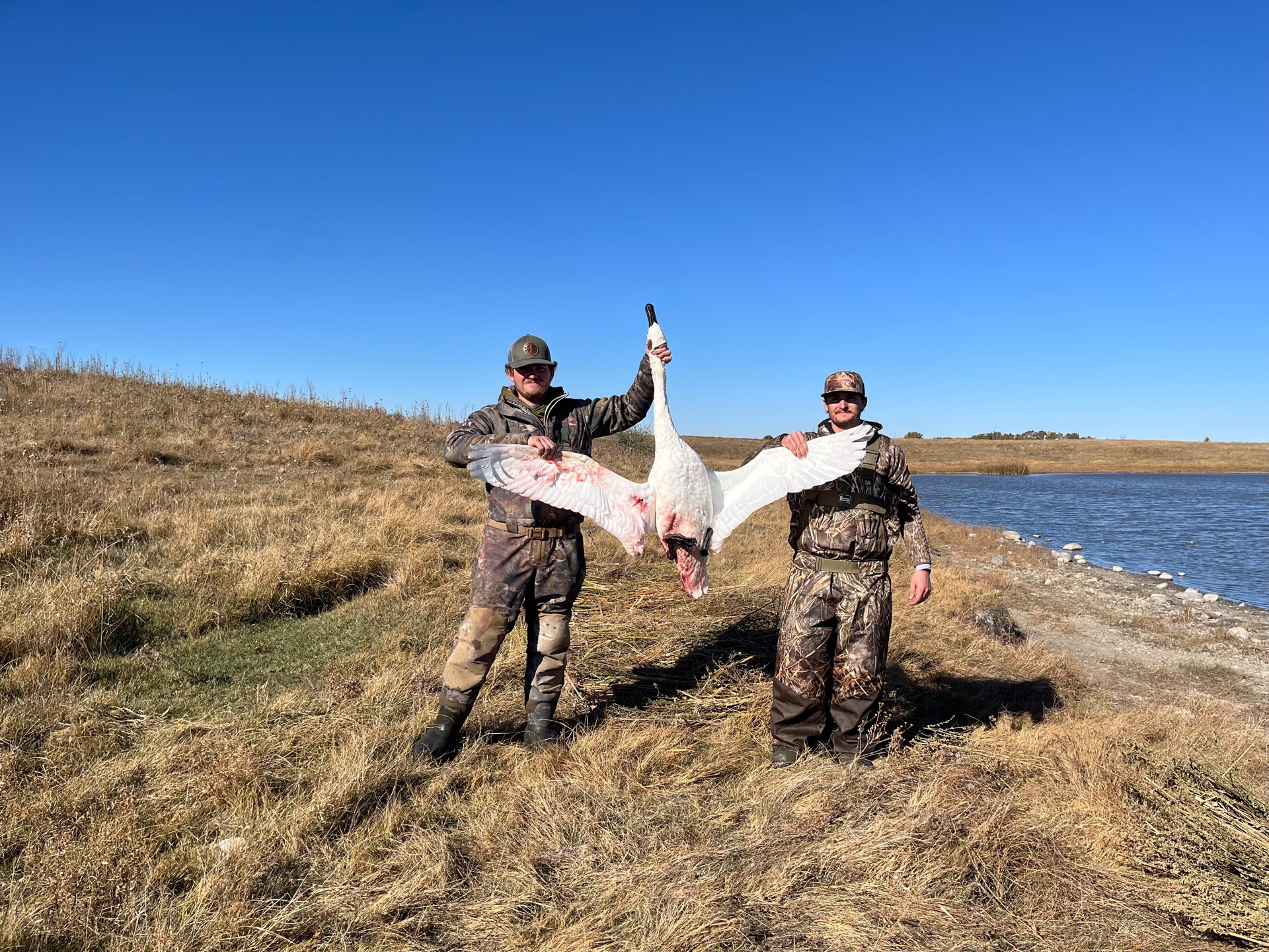 Tanner and his brother in the marsh